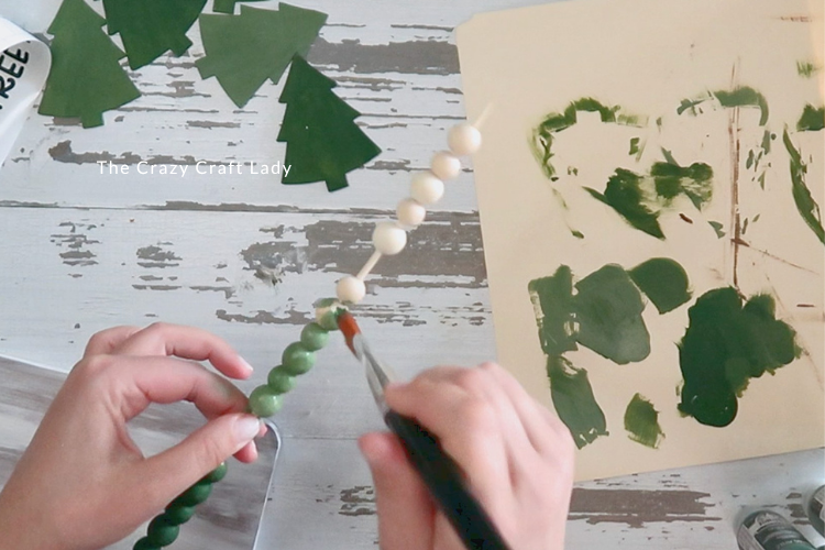 paint wood beads green
