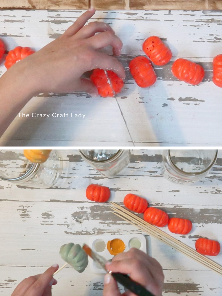 cut mini foam pumpkins in half and paint