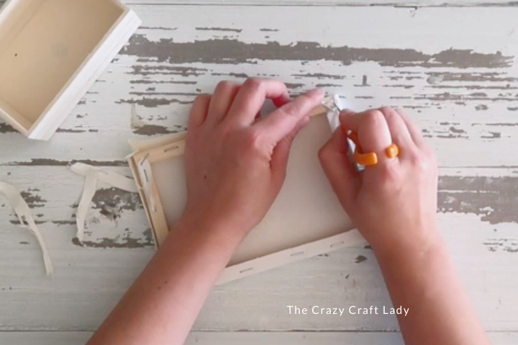 remove stretched canvas from wood frame