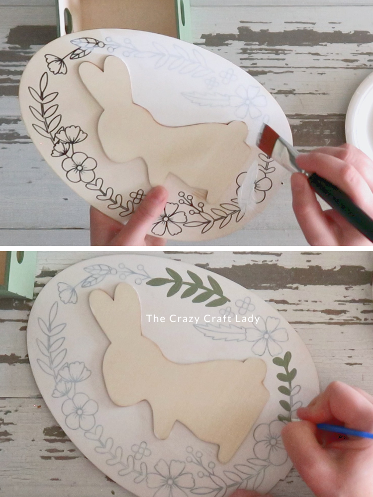 paint wood egg cutout white and paint leaves moss green