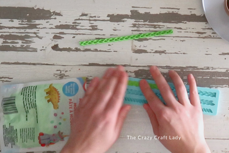 press clay into silicone mold