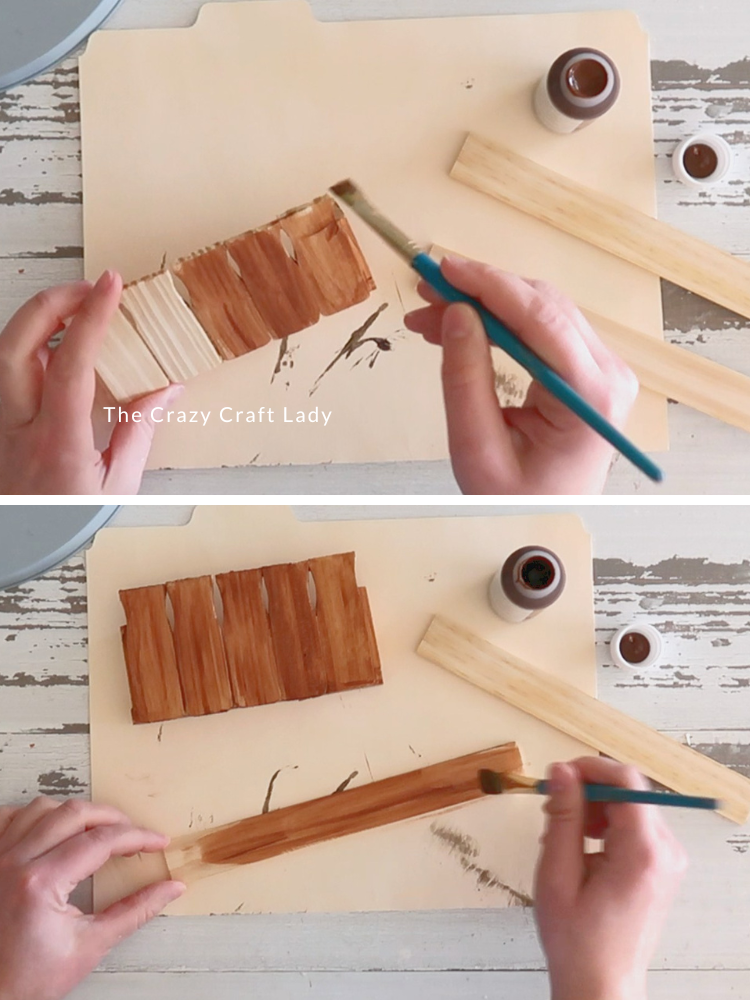 stain paint stir sticks and wood half crate