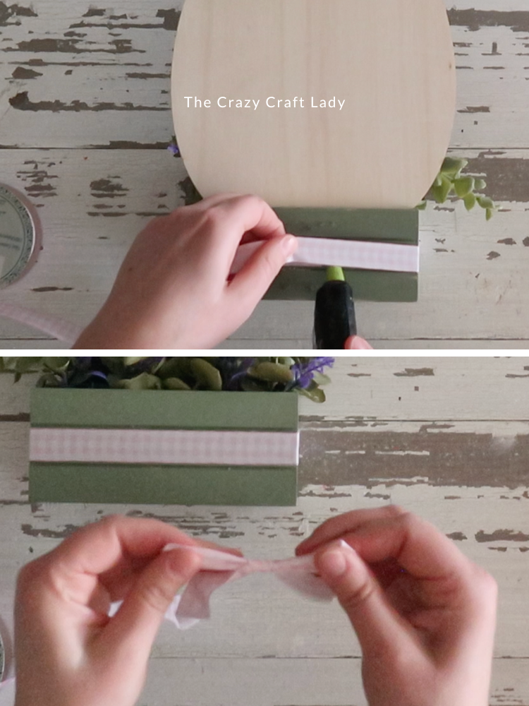 wrap mini wood crate with ribbon and add a small bow