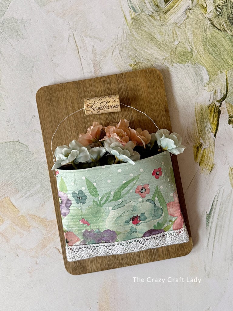 DIY crushed can spring flower wall pocket