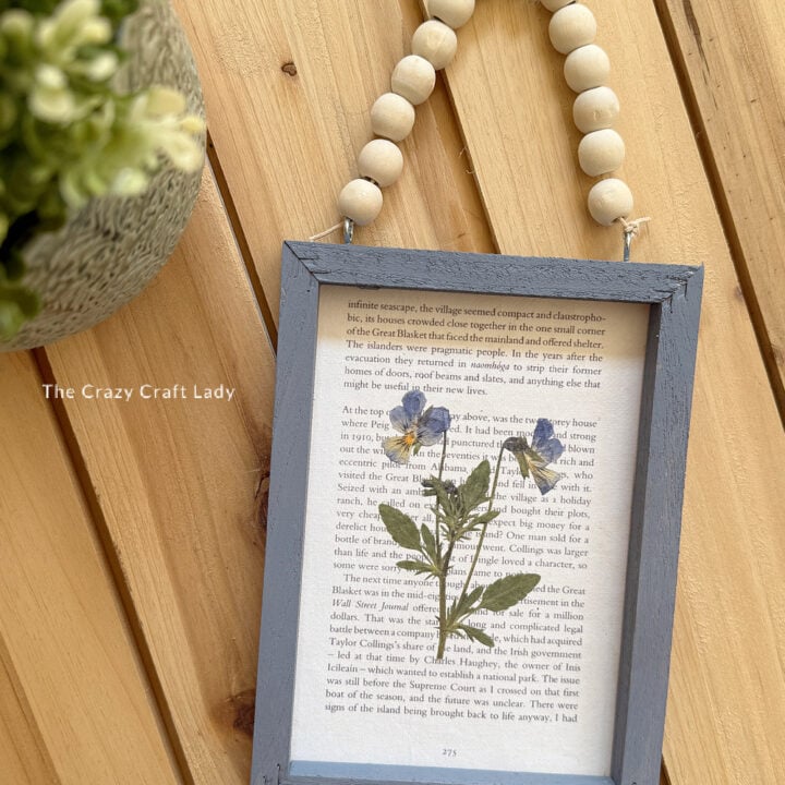 Framed Book Page and Pressed Flower on a Wood Bead Hanger