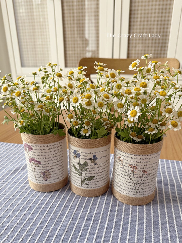 vintage flower and book page tin can vases
