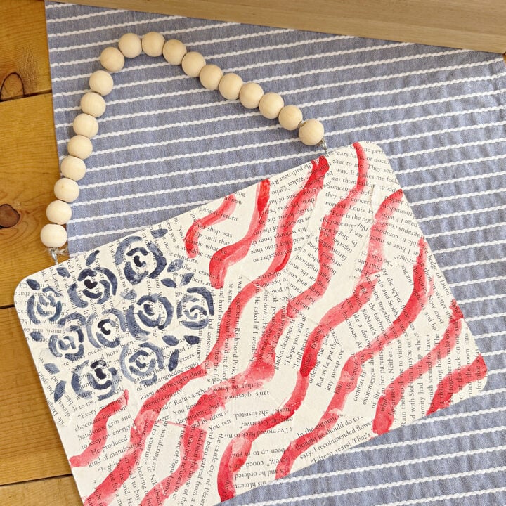 DIY Watercolor American Flag Painting with blue flowers and red waves