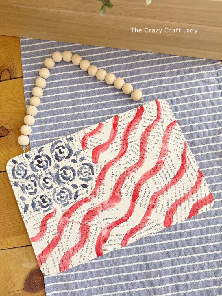 DIY Watercolor American Flag Painting with blue flowers and red waves