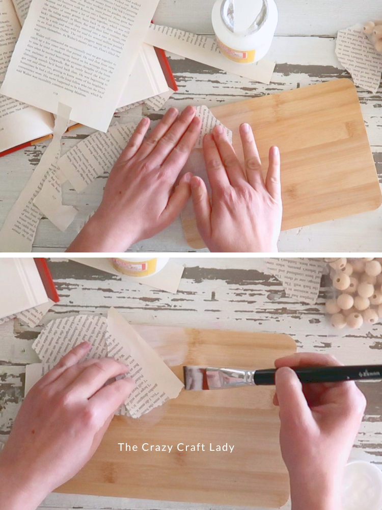 mod podge book page pieces to bamboo cutting board