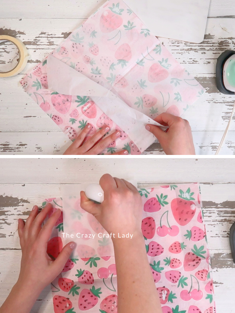 separate napkin layers and heat press onto wood surface