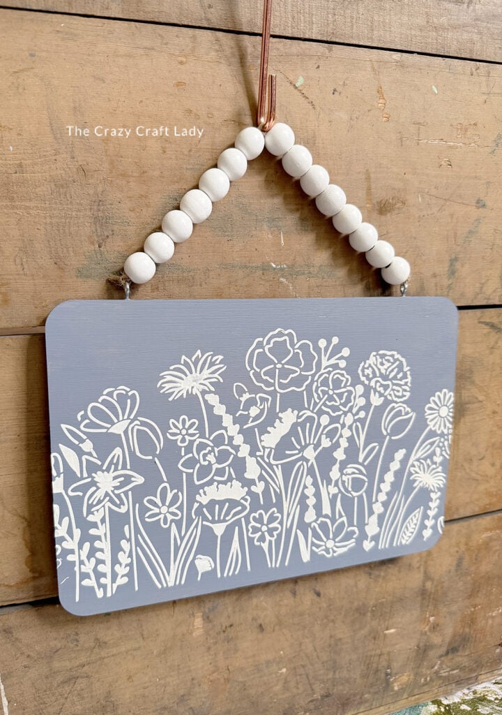 Dollar Store Cutting Board Sign with Textured Flower Stencil Detail