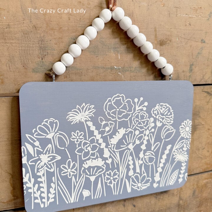 Dollar Store Cutting Board Sign with Textured Flower Stencil Detail