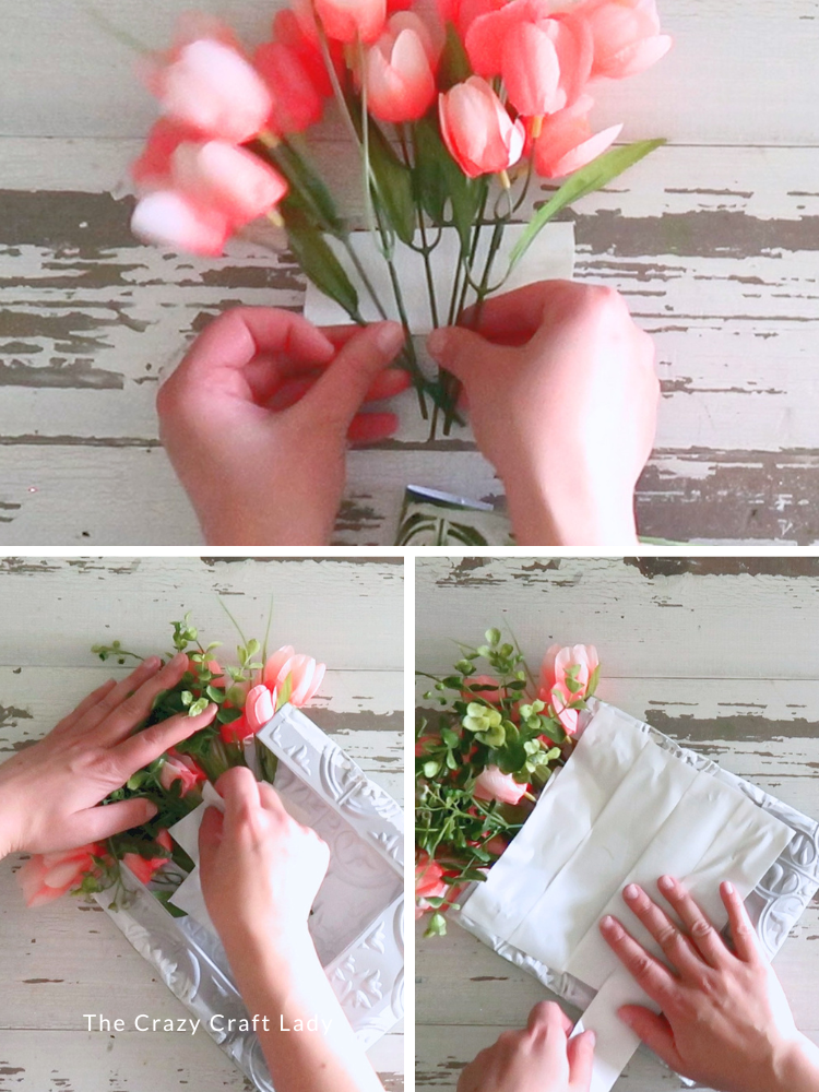add faux pink tulips to the pocket