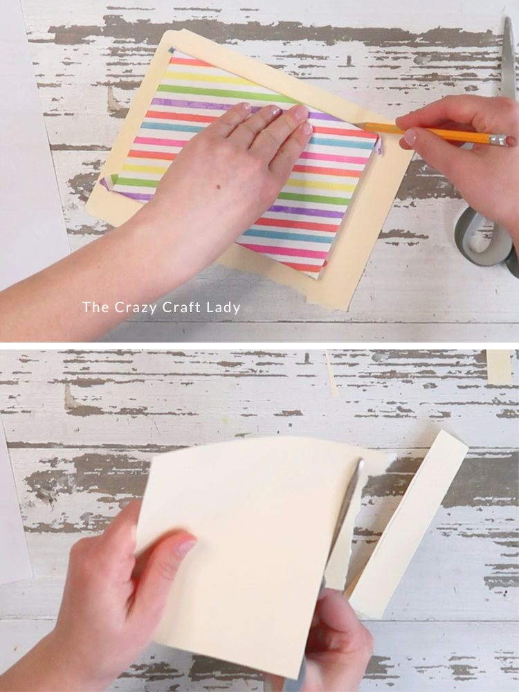 trace stretched canvas onto folder and trim to size