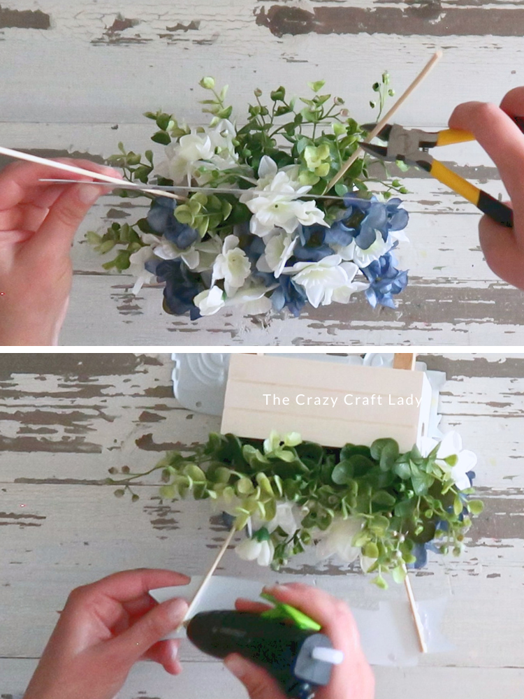 trim bamboo skewers down and glue on banner sign