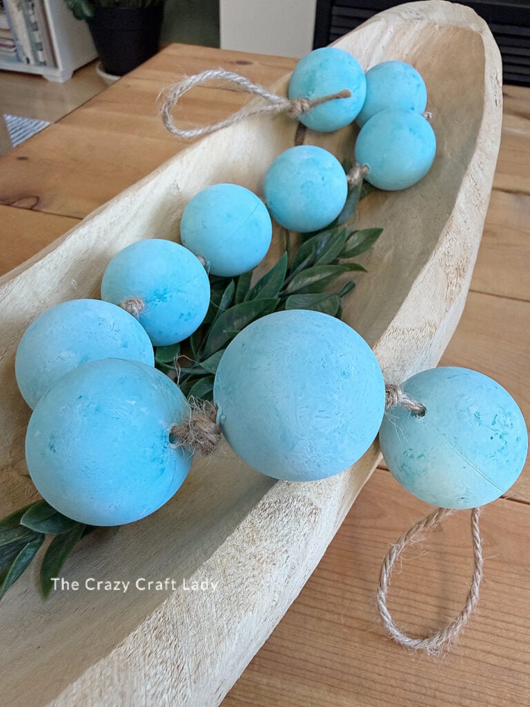 DIY faux zeeglas groenblauw bollenslinger