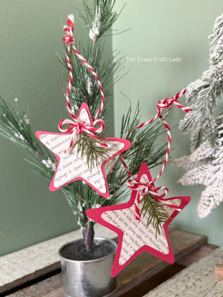 book page star Christmas ornaments with faux pine and bakers twine