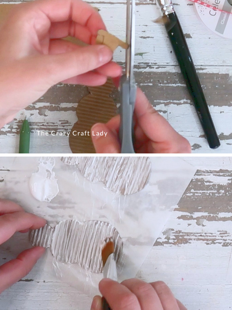 cut out cardboard tophat and paint snowman white