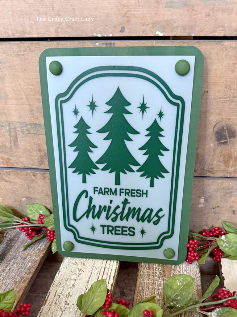 farm fresh Christmas trees frosted green sign