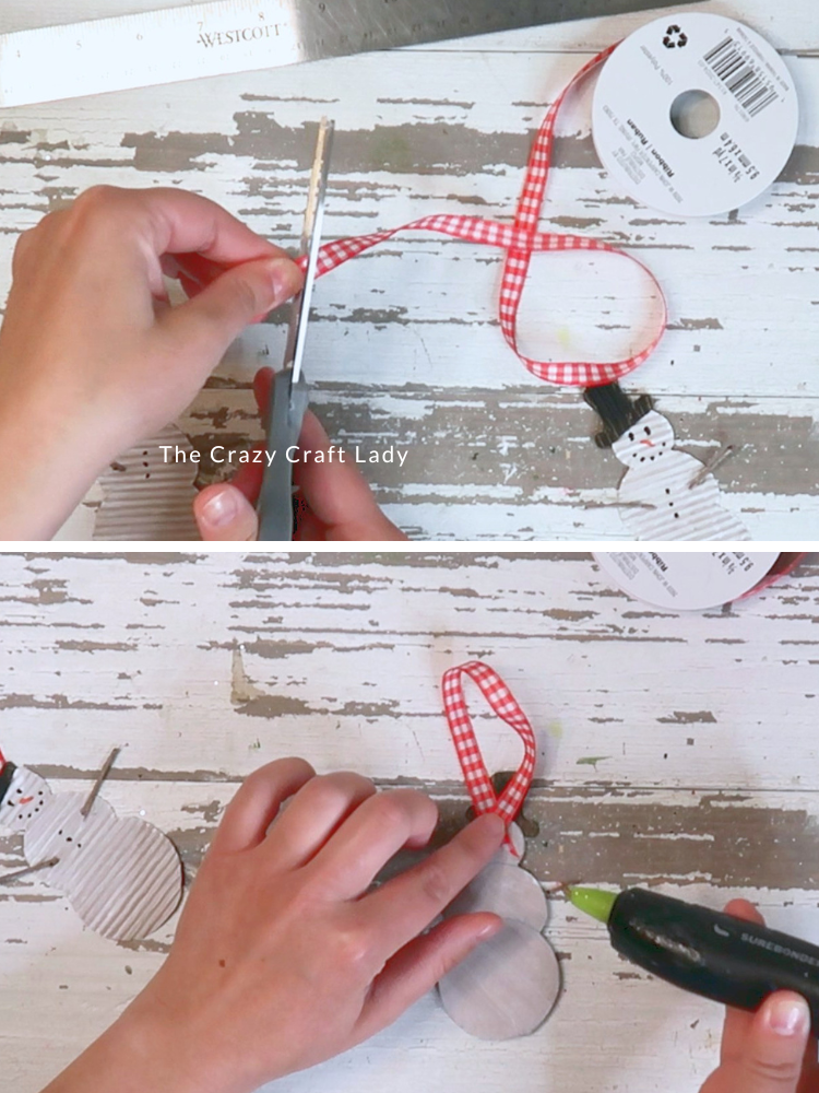 hot glue ribbon hanger to back of snowman ornament