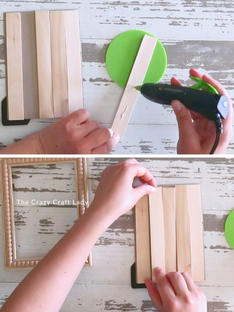 hot glue wood craft sticks to picture frame backer
