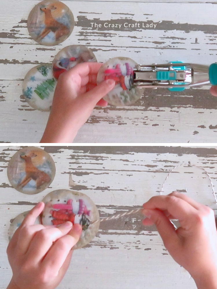 punch a hole in each ornament and string up with twine