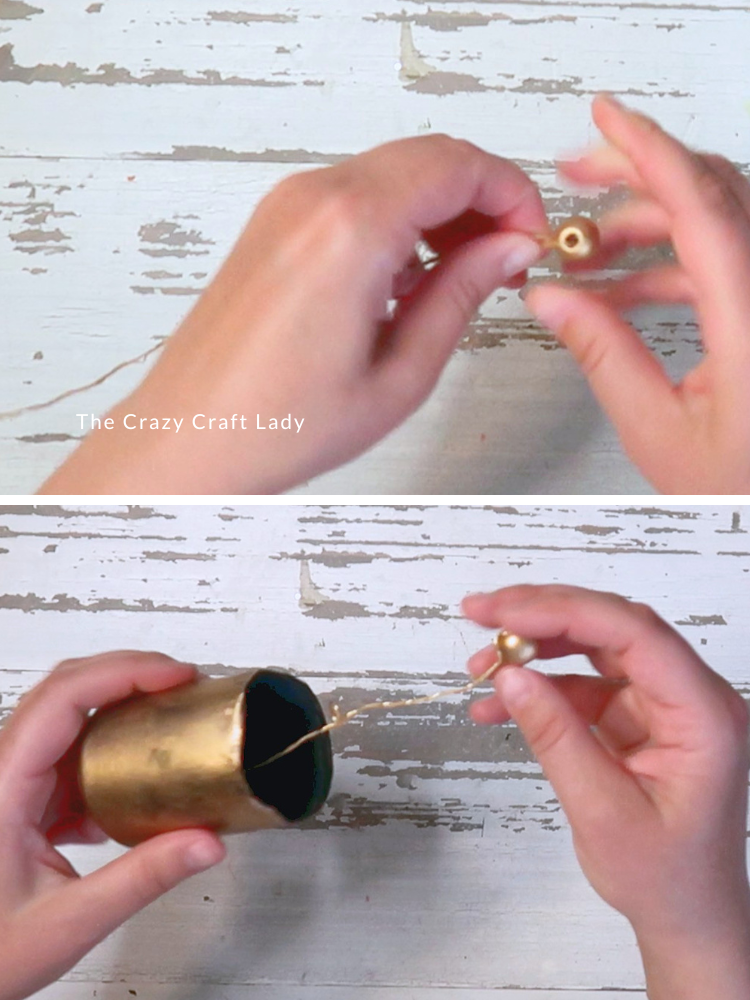 string bead onto wire and string through soda can