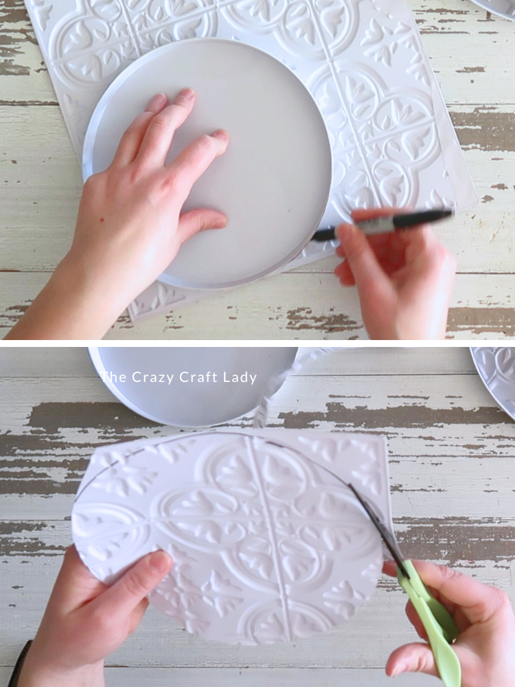 trace burner cover onto tin tile and cut out