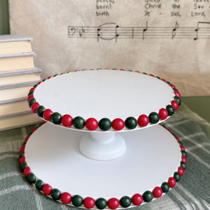 white tiered tray with green and white bobbin edge detail