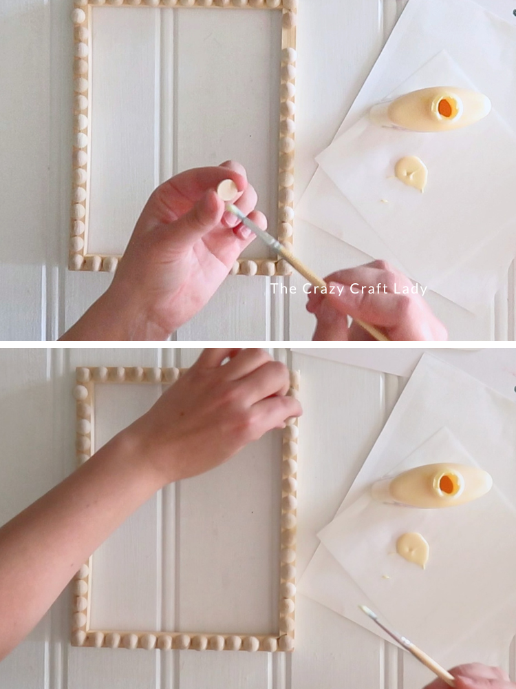glue wood half balls around wood frame