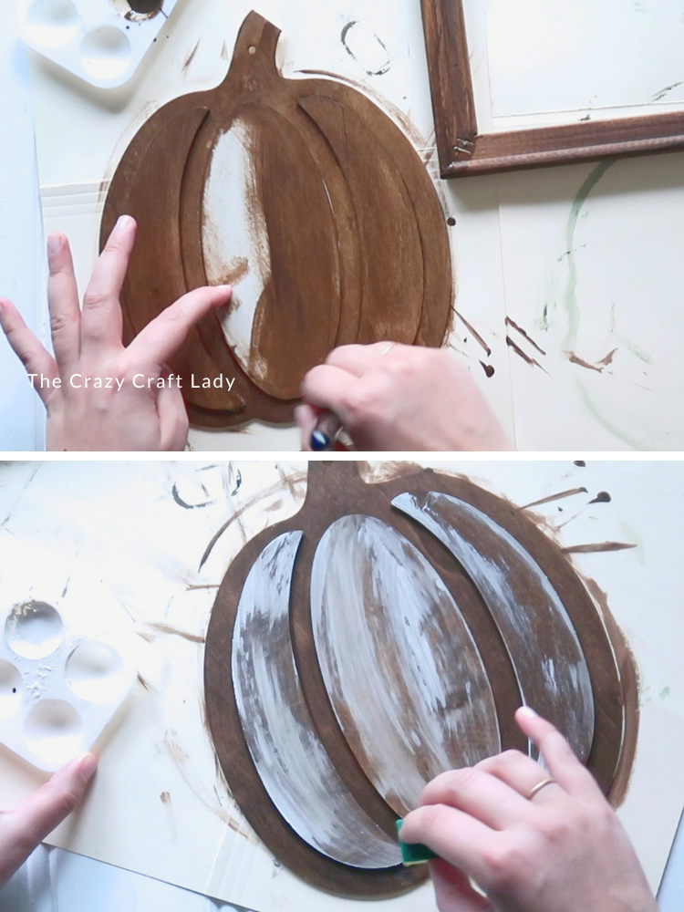 stain wood pumpkin cutout and distress with cream paint