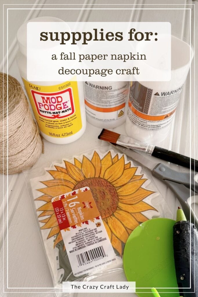 supplies for a fall napkin paper napkin and candle decoupage craft
