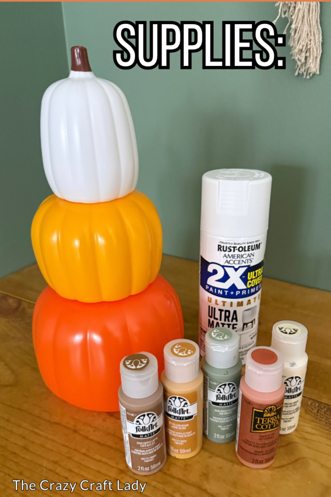 supplies include 3 plastic stacked pumpkins and paint