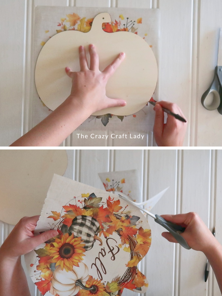 trace wood pumpkin onto calendar page and cut out
