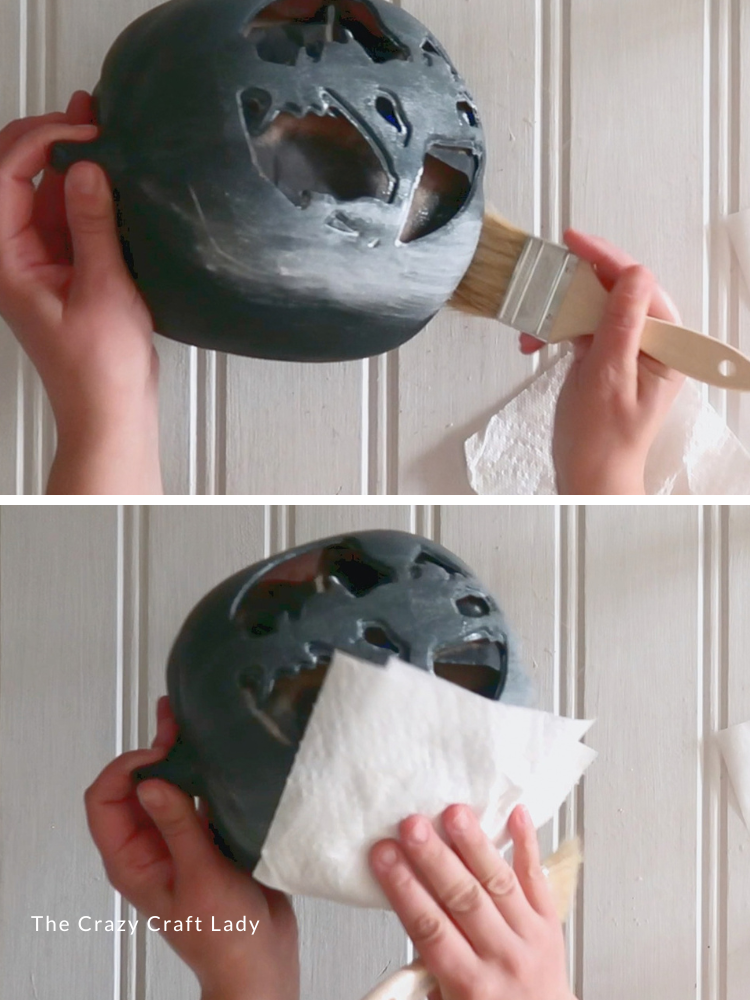 white wash black jack o lantern and blot away excess with paper towel