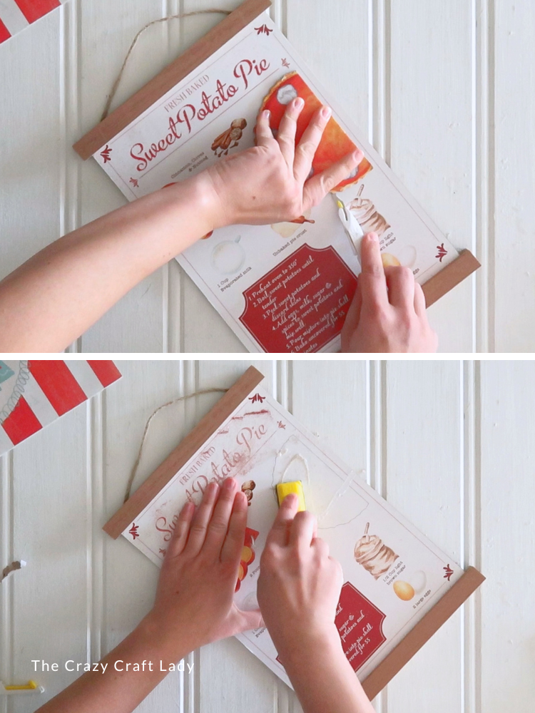 remove 3 D embellishment and sand away glitter and glue from sign
