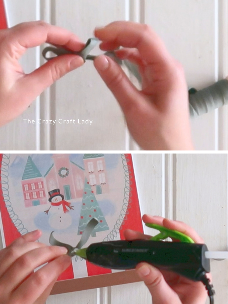 tie a soft teal bow and hot glue to the sign